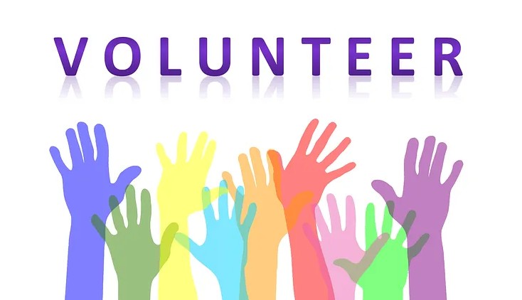 Rainbow coloured hands "Volunteering"